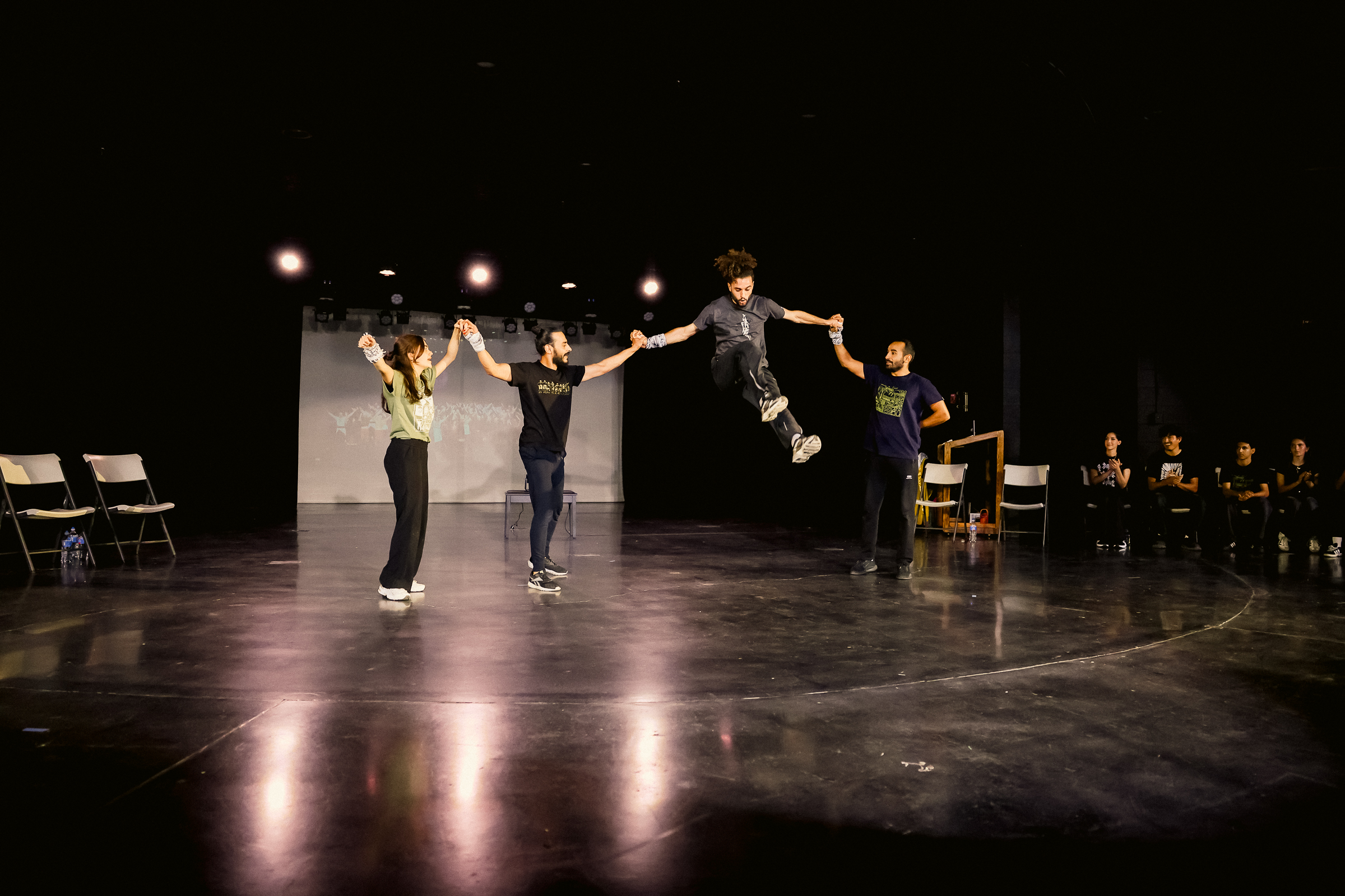 Stage performance with synchronized jump